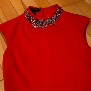 Ted Baker Bold Red Garment with Elegant Details